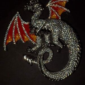 Sparkling Dragon Brooch with Red and Orange Accents